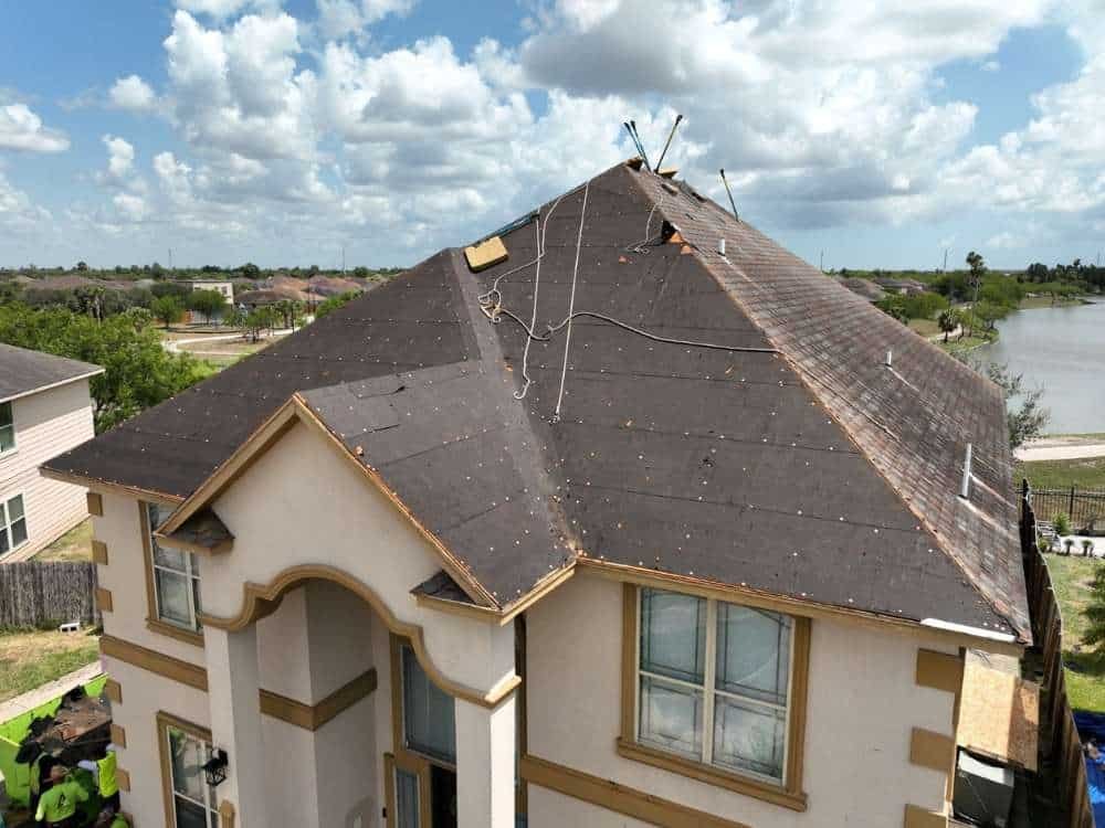 Aging Roof on a Two-Story Home Ready for Replacement Aging Roof on a Two-Story Home Ready for Replacement