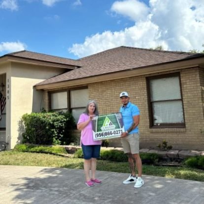 Customer Celebrating a Successful Roof Renovation