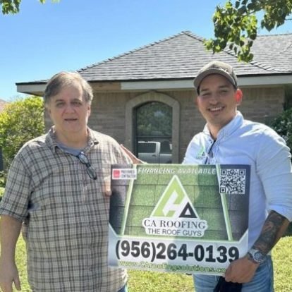 Homeowner Standing Beneath Their Newly Installed Roof
